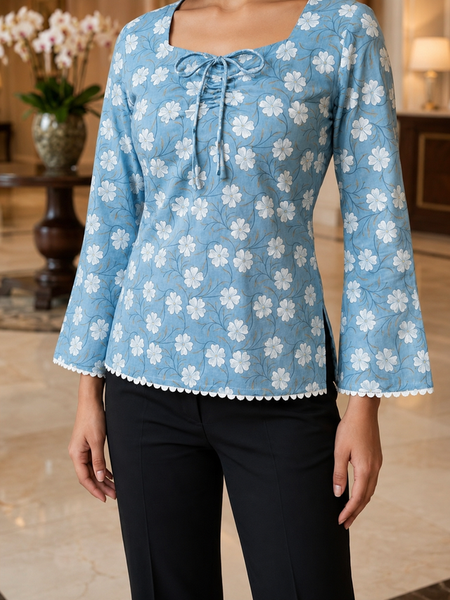 Gen Z inspired Powder Blue floral bell sleeve fitted Kurti with square neck and lace trim.