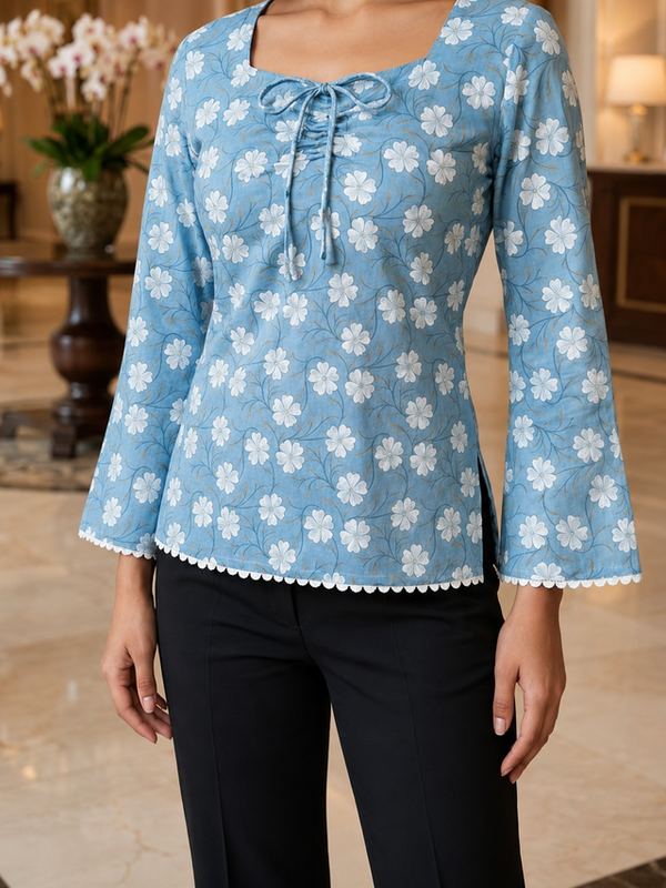 Gen Z inspired Powder Blue floral bell sleeve fitted Kurti with square neck and lace trim.